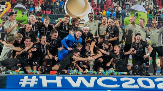 German players celebrate with trophy after beating Belgium in the 2023 Men's FIH Hockey World Cup final(PTI)