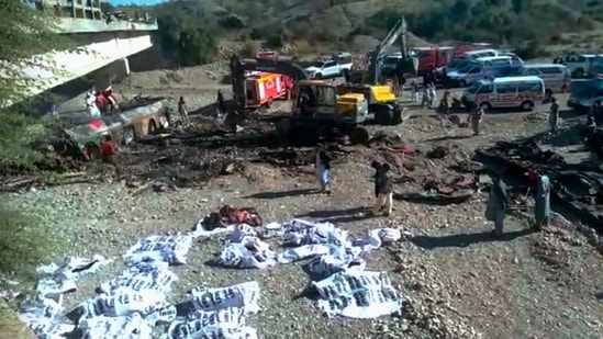 Firefighters and workers from the Lasbela Welfare Trust and the Edhi Welfare Foundation carried out the rescue operation. (AP)