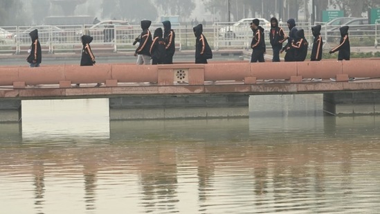 Group of children at the newly renovated India Gate complex, part of the Central Vista redevelopment project, inaugurated in September.(Vipin Kumar/HT Photo)