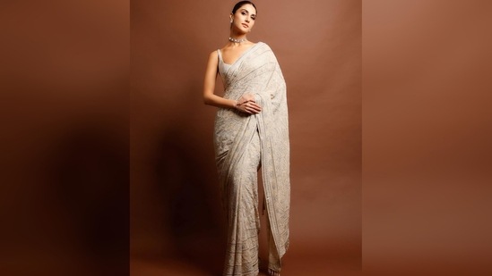 Vaani Kapoor's saree is a creation of ace Indian designer Tarun Tahiliani known for his intricate detailings in contemporary Indian wear.(Instagram/@_vaanikapoor_)