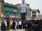 Congress leader Rahul Gandhi hoists the national flag during the Bharat Jodo Yatra in Lal Chowk area of Srinagar on Sunday. (Waseem Andrabi /Hindustan Times) Congress leader Rahul Gandhi hoists the national flag during the Bharat Jodo Yatra in Lal Chowk area of Srinagar on Sunday. (Waseem Andrabi /Hindustan Times)