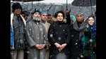 Congress president Mallikarjun Kharge, party leader Rahul Gandhi and party's general secretary Priyanka Gandhi Vadra at the concluding event of the party's Bharat Jodo Yatra amid heavy snowfall, in Srinagar on Monday. (AICC) Congress president Mallikarjun Kharge, party leader Rahul Gandhi and party's general secretary Priyanka Gandhi Vadra at the concluding event of the party's Bharat Jodo Yatra amid heavy snowfall, in Srinagar on Monday. (AICC)