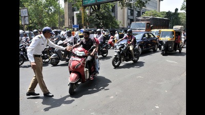 As many as 3,000 such bike riders have been intercepted in the past three weeks and a total ₹1.50 lakh has been collected (HT FILE PHOTO) As many as 3,000 such bike riders have been intercepted in the past three weeks and a total ₹1.50 lakh has been collected (HT FILE PHOTO)