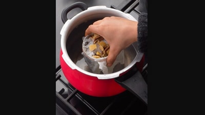 The image, taken from the viral Instagram video, shows a person making ‘Dum ki chai’. (Instagram/@spoonsofdilli)
