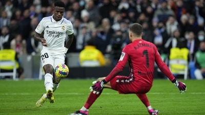Real Madrid Vinicius Junior takes a shot on goal in front of Real Sociedad. (AP) Real Madrid Vinicius Junior takes a shot on goal in front of Real Sociedad. (AP)