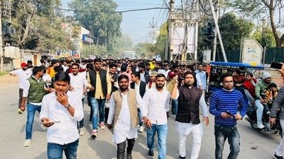 Students taking out a march in Prayagraj on Monday. (HT PHOTO) Students taking out a march in Prayagraj on Monday. (HT PHOTO)