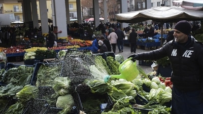 Terrorist Attack Warning In Turkey: A man waters his vegetables at a food market in Ankara, Turkey. (AP)
