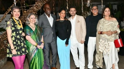 Masaba Gupta poses for the paparazzi with her husband Satyadeep Misra and their family members including her parents Neena Gupta and Viv Richards. (HT Photo/Varinder Chawla)