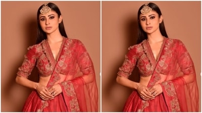 Assisted by makeup artist Mukesh Patil, Mouni decked up in red eyeshadow, black eyeliner, black kohl, mascara-laden eyelashes, drawn eyebrows, contoured cheeks and a shade of nude lipstick. (Instagram/@imouniroy) Assisted by makeup artist Mukesh Patil, Mouni decked up in red eyeshadow, black eyeliner, black kohl, mascara-laden eyelashes, drawn eyebrows, contoured cheeks and a shade of nude lipstick. (Instagram/@imouniroy)