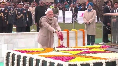 Prime Minister Narendra Modi paying tribute at Raj Ghat in Delhi. (ANI)