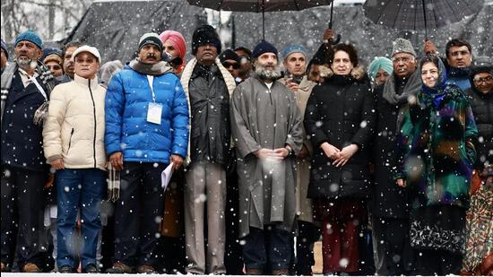 Congress leaders at the Bharat Jodo Yatra amid heavy snowfall in Srinagar on Monday. (AICC)