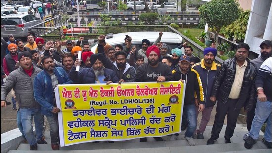 LTUN Taxi owners’ welfare society holding a protest at DC office regarding Punjab government's new vehicle scrapping policy in Ludhiana on Monday. (Gurpreet Singh/HT)