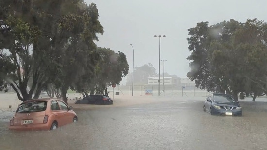 Auckland Floods: Cars are seen in a flooded street during heavy rainfall in Auckland, New Zealand.(Reuters)