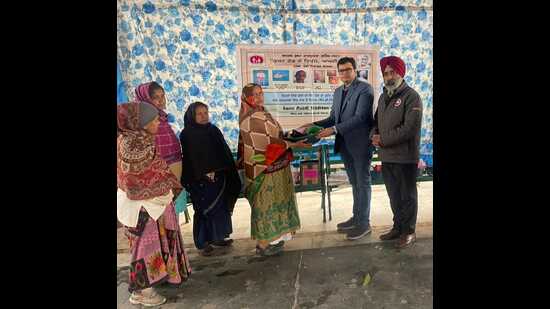 On World Leprosy Day, the district leprosy officer Rohit Rampal visited Kusht Ashram in Islamganj, Ludhiana, and distributed self-care kits, and supportive medicines to the residents of the leprosy colony. (HT PHOTO)