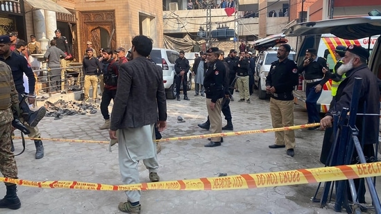 At least 32 people were killed and around 147 injured after a Taliban suicide bomber blew himself up in a mosque packed with worshippers on Monday in the high-security zone in Pakistan's northwestern Peshawar city. (AFP)