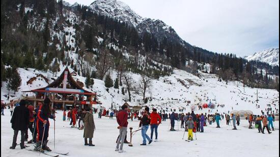 Tourists enjoy skiing at Solang Valley near Manali in Himachal Pradesh. Solang got 22 inches of snow on Monday. (ANI Photo)