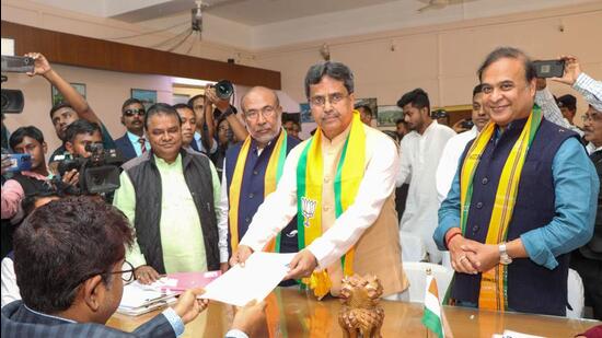 Tripura chief minister and BJP leader Manik Saha files his nomination papers for the upcoming Tripura assembly elections in Agartala on Monday. Assam CM Himanta Biswa Sarma and Manipur CM N Biren Singh are also seen. (PTI) Tripura chief minister and BJP leader Manik Saha files his nomination papers for the upcoming Tripura assembly elections in Agartala on Monday. Assam CM Himanta Biswa Sarma and Manipur CM N Biren Singh are also seen. (PTI)