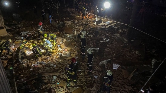 Russia-Ukraine War: Ukrainian firefighters work at a site of an apartment building severely damaged by a Russian missile strike.(Reuters)