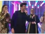Aamir Khan with Kartik Aaryan at a wedding. Aamir Khan with Kartik Aaryan at a wedding.