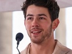 Priyanka Chopra held Malti in her arms as Nick Jonas gave a speech. Priyanka Chopra held Malti in her arms as Nick Jonas gave a speech.