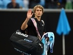 Tennis - Australian Open - Melbourne Park, Melbourne, Australia - January 19, 2023 Germany's Alexander Zverev walks off the court after losing his second round match against Michael Mmoh of the U.S. REUTERS/Hannah Mckay