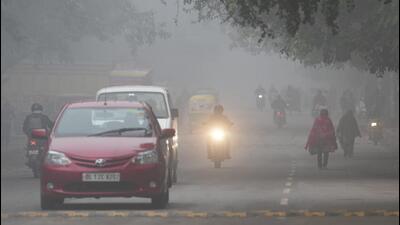 A foggy and smoggy winter morning in New Delhi on Tuesday. (PTI) A foggy and smoggy winter morning in New Delhi on Tuesday. (PTI)