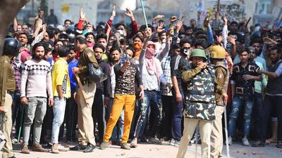 A mob armed with sticks during a protest against citizenship laws in north-east Delhi on February 24, 2020. (Raj K Raj/HT PHOTO)