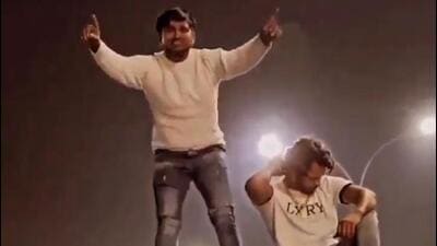 A video was shared on social media websites showing two men dancing on the roof of a car parked near Okhla barrage near Sector 94 in Noida. A video was shared on social media websites showing two men dancing on the roof of a car parked near Okhla barrage near Sector 94 in Noida.