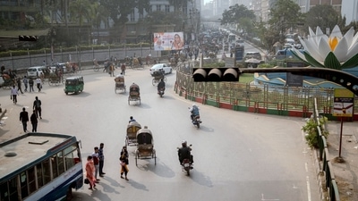 Bangladesh Economy: Vehicles travel along a road in Dhaka, Bangladesh. (Bloomberg)