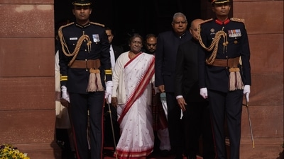 Indian President Droupadi Murmu, center, walks in a procession towards the central hall to address the opening day of the Parliament's budget session, in New Delhi, India, Tuesday, Jan. 31, 2023. (AP Photo/Manish Swarup) (AP) Indian President Droupadi Murmu, center, walks in a procession towards the central hall to address the opening day of the Parliament's budget session, in New Delhi, India, Tuesday, Jan. 31, 2023. (AP Photo/Manish Swarup) (AP)