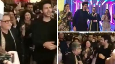 Aamir Khan with Kartik Aaryan at a wedding. Aamir Khan with Kartik Aaryan at a wedding.