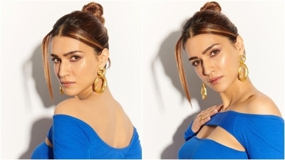 Kriti accessorised the ensemble with gold double-hoop earrings, matching rings, strappy high heels, and a chunky bracelet. In the end, Kriti chose a centre-parted sleek top bun, subtle smoky eye shadow, nude lip shade, mascara on the lashes, blushed glowing skin, and feathered brows for the glam picks. (Instagram) Kriti accessorised the ensemble with gold double-hoop earrings, matching rings, strappy high heels, and a chunky bracelet. In the end, Kriti chose a centre-parted sleek top bun, subtle smoky eye shadow, nude lip shade, mascara on the lashes, blushed glowing skin, and feathered brows for the glam picks. (Instagram)