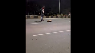 Man saves dogs life after rescuing it from the middle of a road. (Instagram/@ Kartavya society) Man saves dogs life after rescuing it from the middle of a road. (Instagram/@ Kartavya society)