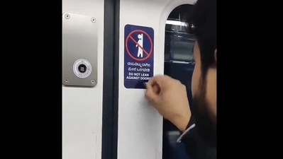 A video of the man, identified as Akshat Gupta, peeling stickers meant to hide Hindi instructions in Bengaluru's Metro went viral earlier. (@ForeverBLRU/Twitter) A video of the man, identified as Akshat Gupta, peeling stickers meant to hide Hindi instructions in Bengaluru's Metro went viral earlier. (@ForeverBLRU/Twitter)