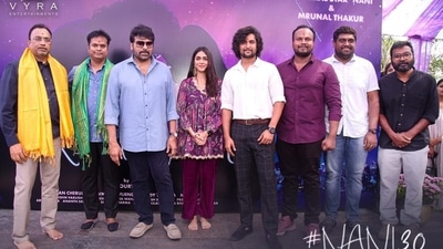 Mrunal Thakur and Nani with Chiranjeevi and Nani30 team. Mrunal Thakur and Nani with Chiranjeevi and Nani30 team.