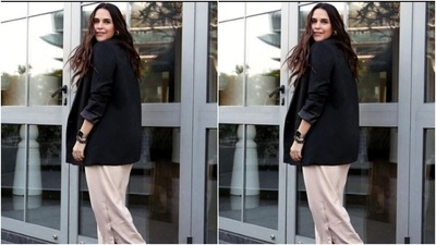 Neha decked up in minimal makeup to complement her ensemble. In nude eyeshadow, black eyeliner, black kohl, mascara-laden eyelashes, drawn eyebrows, contoured cheeks and a shade of nude lipstick, she aced the look.&nbsp; (Instagram/@nehadhupia)