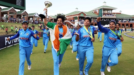 Potchefstroom, Jan 29 (ANI): India Women players celebrate with trophy after winning the U19 T20 World Cup final against England Women, at Senwes Park, in Potchefstroom on Sunday. (ANI Photo)(BCCI Women Twitter)