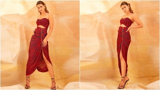 Earlier, Kriti had posted pictures of her stylish avatar from another promotional event for Shehzada with the caption, "Stripe It! [kiss emoji]." She wore a red and black stripe printed bralette and skirt for the occasion. While the strapless top features a cropped hem and fitted bust, the skirt comes with gathered pleat details, a thigh-high slit, an asymmetric hem, and a front zipper.&nbsp;(Instagram)