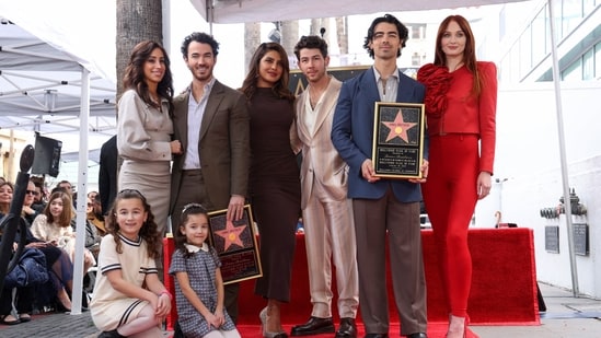 The Jonas Brothers pose with their family during their star unveiling ceremony on The Hollywood Walk of Fame in Los Angeles, California, U.S., January 30, 2023. REUTERS/Mario Anzuoni(REUTERS)