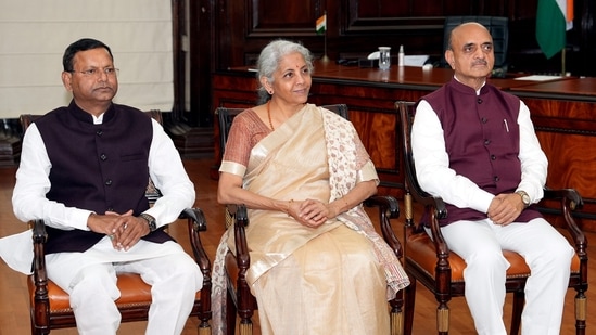 Finance Minister Nirmala Sitharaman with Ministers of State for Finance Bhagwat Karad and Pankaj Chaudhary during the final touches of Union Budget 2023-24, at Finance Ministry in New Delhi,(PTI)