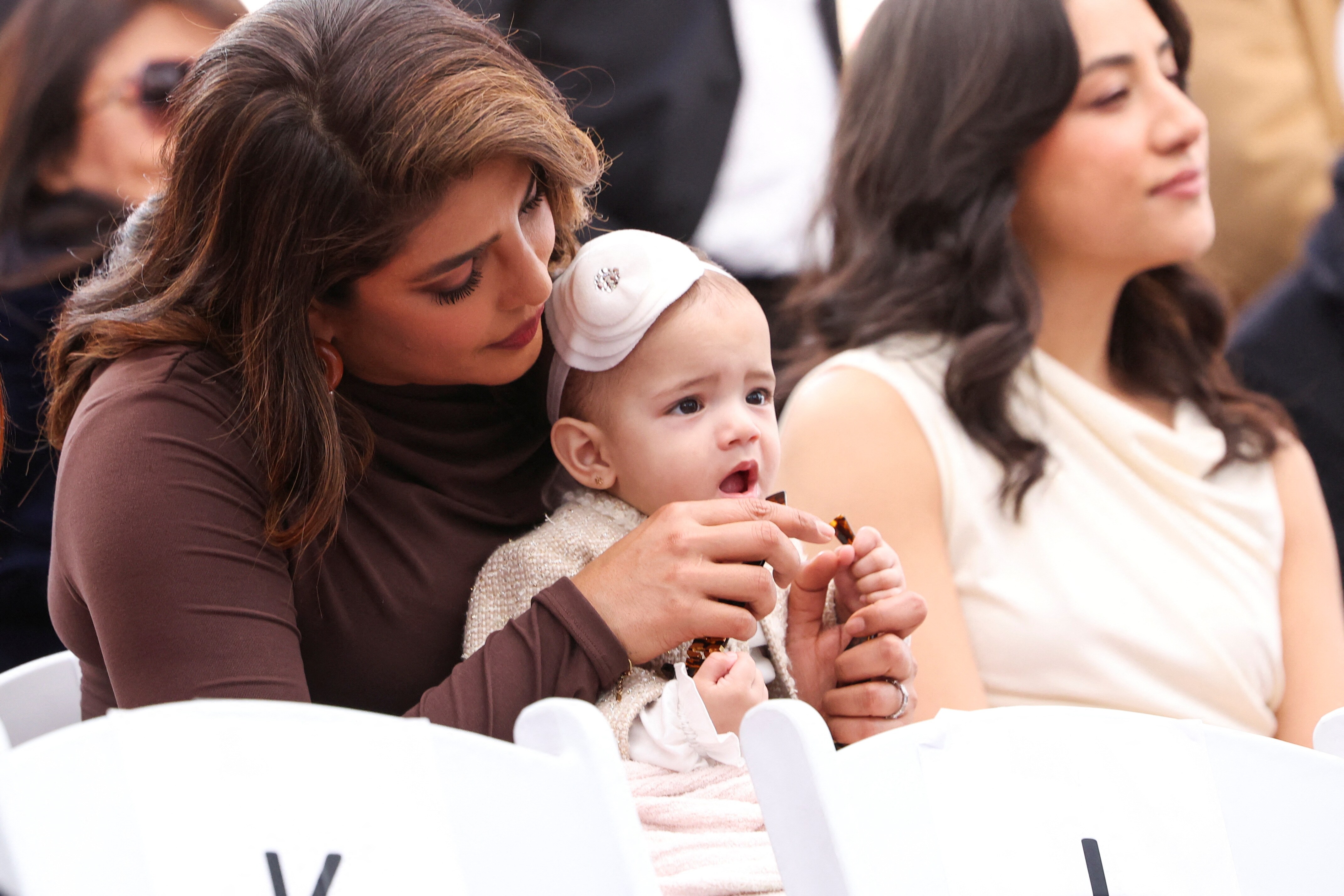 Priyanka Chopra holds her and Nick Jonas' daughter, Malti, during the ceremony where the Jonas Brothers will unveil their star on The Hollywood Walk of Fame in Los Angeles, California, U.S., January 30, 2023. REUTERS/Mario Anzuoni (REUTERS)