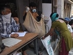 People queue up to take foodgrains from a government PDS shop in New Delhi. (HT file) People queue up to take foodgrains from a government PDS shop in New Delhi. (HT file)