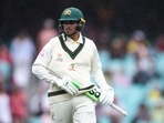 Australia�s Usman Khawaja puts his bat under his jumper as he walks off the ground due to a rain delay during day two of the third cricket Test match between Australia and South Africa at the Sydney Cricket Ground (SCG) in Sydney on January 5, 2023. (Photo by DAVID GRAY / AFP) / - IMAGE RESTRICTED TO EDITORIAL USE - STRICTLY NO COMMERCIAL USE-(AFP) Australia�s Usman Khawaja puts his bat under his jumper as he walks off the ground due to a rain delay during day two of the third cricket Test match between Australia and South Africa at the Sydney Cricket Ground (SCG) in Sydney on January 5, 2023. (Photo by DAVID GRAY / AFP) / - IMAGE RESTRICTED TO EDITORIAL USE - STRICTLY NO COMMERCIAL USE-(AFP)