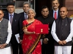 India's Finance Minister Nirmala Sitharaman holds up a folder with the Government of India's logo as she leaves her office to present the federal budget in the parliament, in New Delhi, India, February 1, 2023. REUTERS/Adnan Abidi
