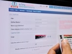 PAN can be linked with Aadhaar on the income tax department’s website after paying a fee of <span class='webrupee'>₹</span>1000, (Photo: Mint)(MINT_PRINT) PAN can be linked with Aadhaar on the income tax department’s website after paying a fee of <span class='webrupee'>₹</span>1000, (Photo: Mint)(MINT_PRINT)
