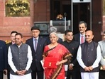 Nirmala Sitharaman chooses a bright red saree with black border and intricate golden work on Budget day. Nirmala Sitharaman chooses a bright red saree with black border and intricate golden work on Budget day.