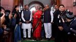 Nirmala Sitharaman, Union minister for finance and corporate affairs along with the ministers of state for finance, Pankaj Chaudhary and Dr. Bhagwat Kishanrao Karad and the senior officials arrived at Parliament ahead of presenting the Union Budget 2023-24 in New Delhi, India, on Tuesday. (Hindustan Times) Nirmala Sitharaman, Union minister for finance and corporate affairs along with the ministers of state for finance, Pankaj Chaudhary and Dr. Bhagwat Kishanrao Karad and the senior officials arrived at Parliament ahead of presenting the Union Budget 2023-24 in New Delhi, India, on Tuesday. (Hindustan Times)