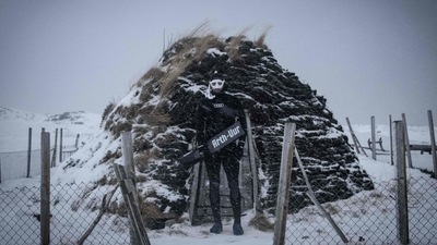 Dressed for his dive with killer whales, Arthur Guerin-Boeri poses in the Spildra Island northern Arctic Circle, on January 26. According to AFP, the Arctic Atlantic ocean is at 3 degrees Celsius, while the the air temperature is at minus 4 degrees Celsius at this time of the year, during the polar nights. (Olivier Morin / AFP) Dressed for his dive with killer whales, Arthur Guerin-Boeri poses in the Spildra Island northern Arctic Circle, on January 26. According to AFP, the Arctic Atlantic ocean is at 3 degrees Celsius, while the the air temperature is at minus 4 degrees Celsius at this time of the year, during the polar nights. (Olivier Morin / AFP)