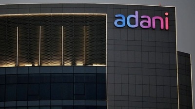 The logo of the Adani Group is seen on the facade of one of its buildings. (Amit Dave / REUTERS)
