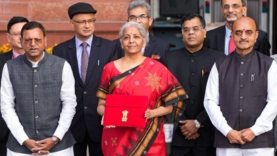 Union Finance Minister Nirmala Sitharaman with Ministers of State Bhagwat Kishanrao Karad and Pankaj Chaudhary and officials poses for photographs outside the Finance Ministry at North Block, in New Delhi, Wednesday, Feb. 1, 2023, ahead of the presentation of the Union Budget 2023-24. (PTI)